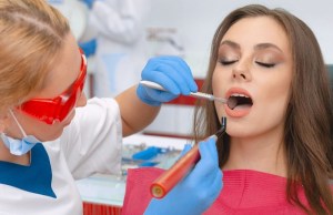 A woman receiving dental filling