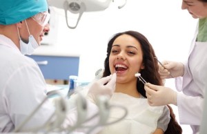 Surgeon performing oral procedure — skilled care for complex tooth or bone treatment