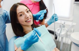 Woman receiving cosmetic treatment &mdash; personalized care for beautiful, confident smile